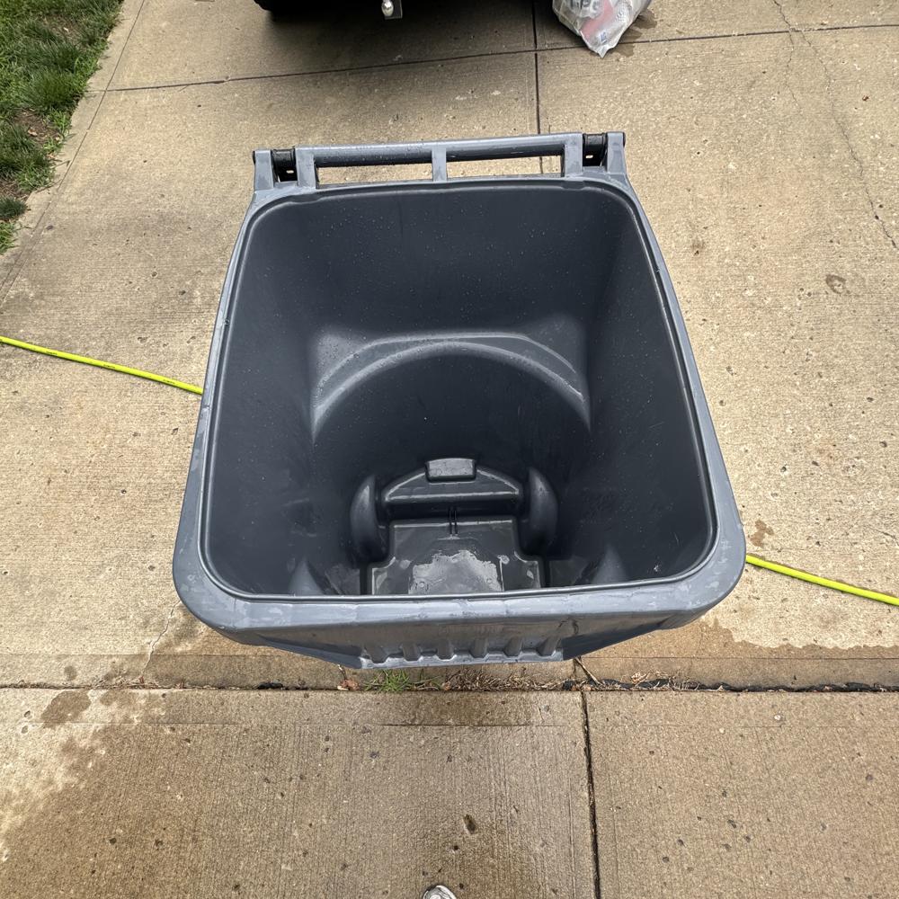 Clean trash can interior after cleaning