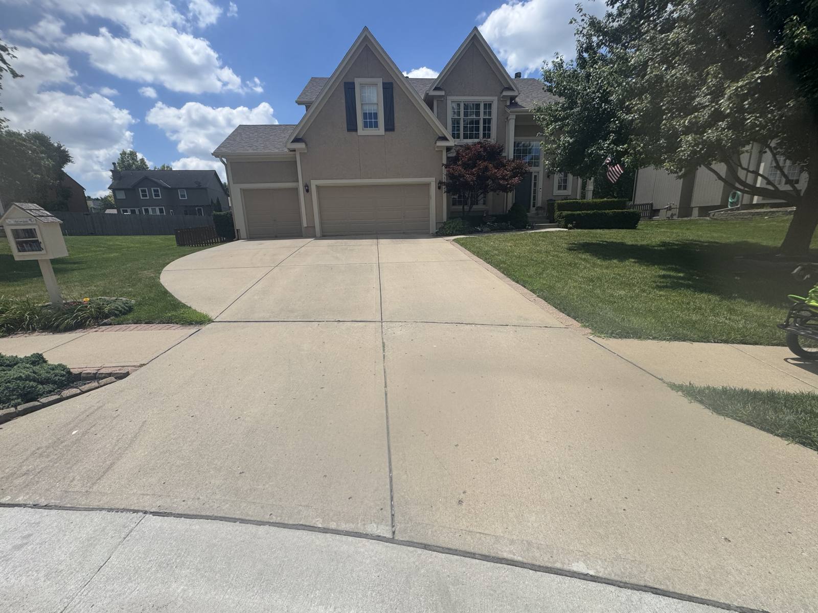 Dirty driveway before pressure washing
