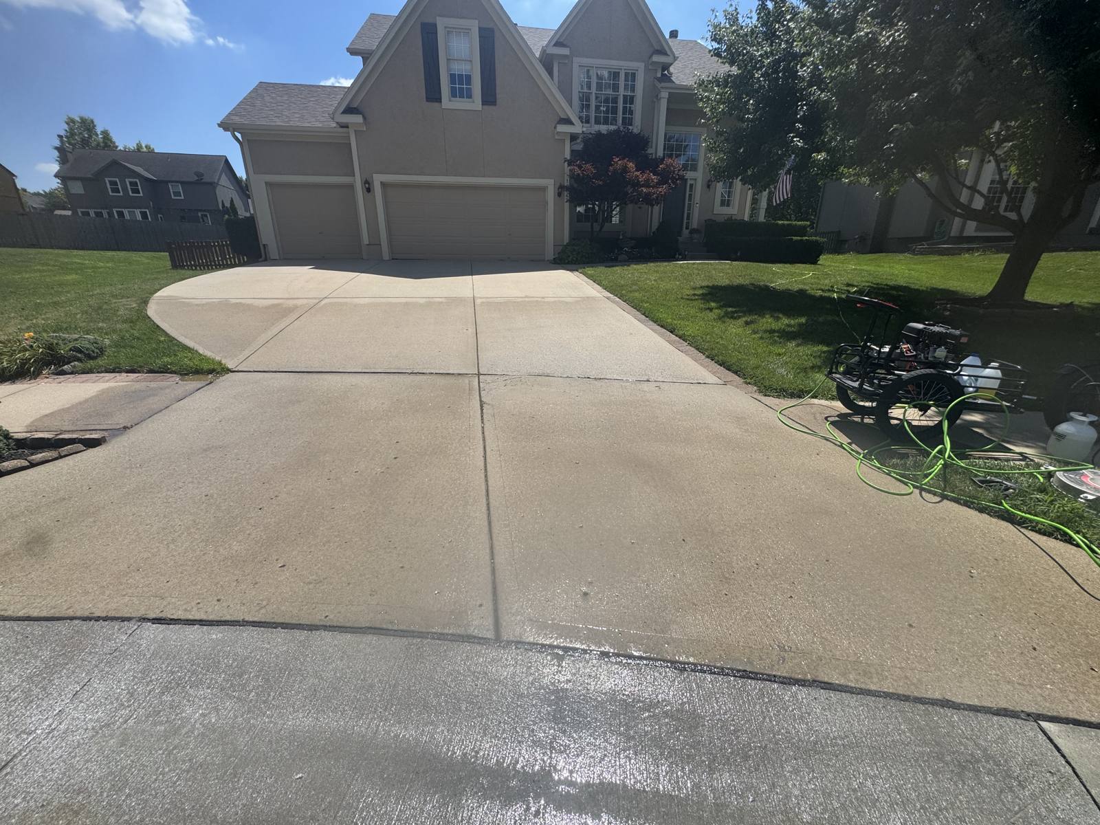 Clean driveway after pressure washing